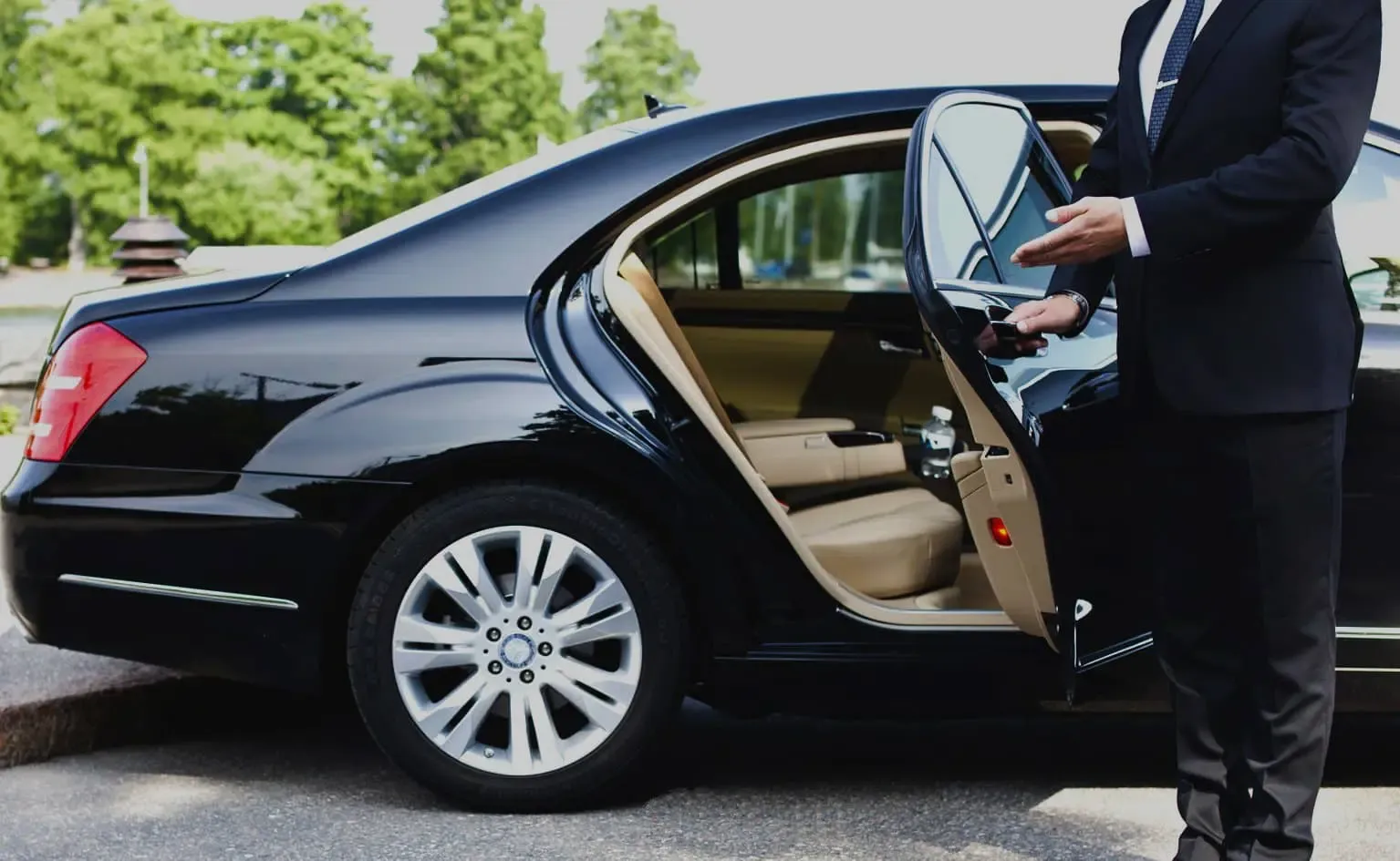 Luxury vehicle service in Marrakech with premium car door